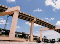  ?? Brett Coomer/ Staff file photo ?? Drivers travel under the Grand Parkway off-ramp into Interstate 45 in Houston. The long-delayed, long-debated I-45 expansion is what the city of Houston and Harris County pumped the brakes on.