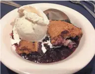  ?? ?? The Inn & Spa at Cedar Falls offers a delicious triple-berry cobbler.