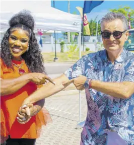  ?? ?? Olivier Guyonvarch, French ambassador to Jamaica, and Khadine “Miss Kitty” Hylton, attorney-at-law and media personalit­y, strike a pose at her recent blood drive.