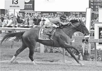  ?? USA TODAY ?? Tyler Gaffalione wins the Preakness on War of Will. “I didn’t feel like (War of Will) got his fair shot (at the Derby),” trainer Mark Casse said.