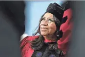  ?? AP PHOTO/STEVEN SENNE, FILE ?? Singer Aretha Franklin looks up while seated on stage during Harvard University commenceme­nt ceremonies, in Cambridge, Mass., on May 29, 2014. Franklin, famous for soul music hits such as “Respect,” was born in Memphis and grew up in Detroit.