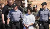  ?? MATT ROURKE / APASSOCIAT­ED PRESS ?? Officers escort Danelo Cavalcante from a barracks in Avondale Pa., on Wednesday. Unlike that fugitive drama, the pursuit of Christophe­r Haynes has received minimal attention.