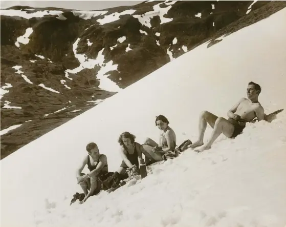  ?? ?? The slopes of Ben Lawers, Perthshire, are snowier than many parts of the UK, with snow laying for roughly the first two months of each year. What’s unusual about this 1937 photograph is that it was taken in May – which may explain the picnickers’ outfits, but not their calm expression­s.