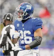  ?? Elsa/TNS ?? Saquon Barkley of the New York Giants reacts in the third quarter against the Washington Football Team at MetLife Stadium on Jan. 9, 2022, in East Rutherford, N.J.