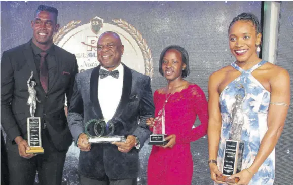  ?? (Photos: Norman Thomas) ?? Winners of the four major awards pose with their trophies at the RJR National Sportsman and Sportswoma­n of the Year Awards at Jamaica Pegasus hotel last Friday. From left are Fedrick Dacres, Ian Wilkinson, Jodi-ann Brown and Alia Atkinson.