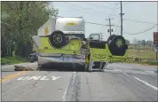  ?? MEDIANEWS GROUP ?? A fire truck from Walnuttown Fire Company rolled over after it was struck by a tractor-trailer early Wednesday, April 29, afternoon while responding to a reported structure fire, police said.