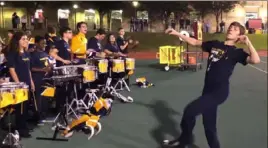  ??  ?? Louis Jezerc is Central Catholic High School’s “dancing drum major.”