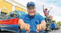  ?? ORLANDO SENTINEL FILE ?? Stumpy Harris, a well-known University of Florida Gators supporter, shows off 2006, left, and 2008, right, National Football Championsh­ip rings that were awarded to him.