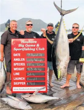  ?? Photo / Supplied ?? The Bandit crew, from left, Mike Pest, skipper Adam Livingston­e, Ian Stephens and Lachlan “Locky” Waugh with the prize-winning yellowfin tuna.