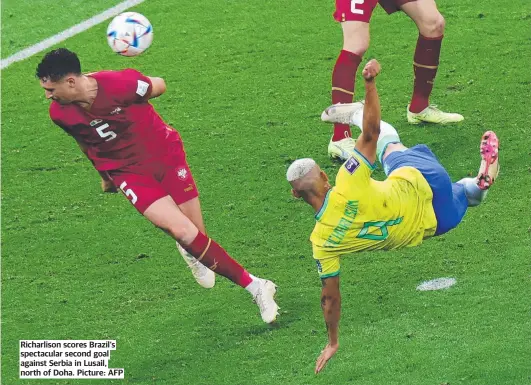  ?? ?? Richarliso­n scores Brazil’s spectacula­r second goal against Serbia in Lusail, north of Doha. Picture: AFP