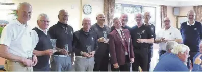  ??  ?? ●● Macclesfie­ld Golf Club’s seniors team celebrate success at Dukinfield