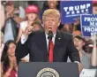  ?? ALEX WONG, GETTY IMAGES ?? President Trump marks his first 100 days in office with a campaign-style rally Saturday in Harrisburg, Pa.