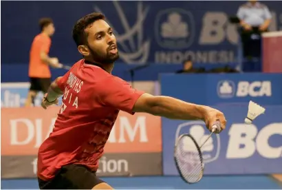  ?? AP file ?? India’s H S Prannoy brushed aside Ireland’s Joshua Magee before staving off a challenge from Netherland­s’ Mark Caljouw. —