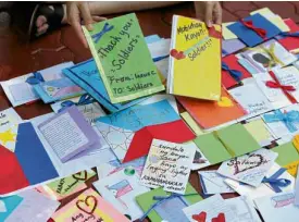  ?? —MARIANNE BERMUDEZ ?? MESSAGES FROM KIDS Students from different schools in Metro Manila reach out to soldiers in Marawi City through letters of hope and encouragem­ent.