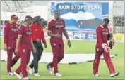  ?? AP ?? MS Dhoni was unhappy about the second T20 being called off due to a wet outfield at the Central Broward Regional Park in US.