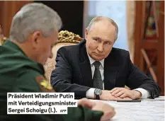  ?? AFP ?? Präsident Wladimir Putin mit Verteidigu­ngsministe­r sergei schoigu (l.).