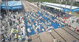  ??  ?? Farmers block train tracks at Bahadurgar­h railway station in New Delhi.