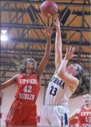  ?? DIGITAL FIRST MEDIA FILE PHOTO ?? Upper Dublin’s Jackie Vargas makes shooting difficult for Cardinal O’Hara’s Stephanie Huesby.