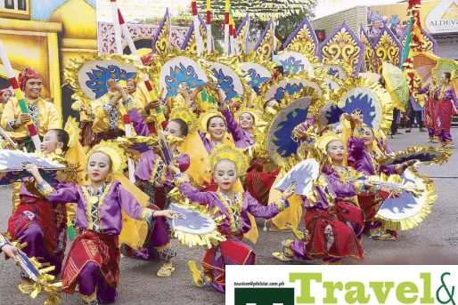  ??  ?? Colorful costumes at the Indak-indak sa Kadalanan street dancing contest at the Kadayawan festival.