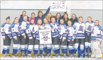  ?? SUBMITTED ?? The NNEC girls hockey team is shown with the NSSAF Northumber­land Regional Division 1 banner last month. In front row are: Rhea Young, Garyn Purvis, Keighan DeCoff, Breanna Sandluck, Shalyn Bona, Paige MacDonald, Caitlin Taylor, Taylor Long, Lindsey MacDonald, Ashley MacDonald, Jayden Palmer, Victoria Dunn. In back from left are: KJ Emery, Jenna Landry, Sophia Wornell, Camryn Halliday, Jensen Arsenault, Eva Wornell and Sarah MacNeil. Missing from photo was Heath Miller.