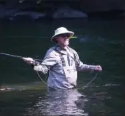  ?? Beth BrelJe — MeDianeWS groUP ?? Bill Quigg of Shillingto­n, Berks county, treasurer of the Berks county fly tyers, watches a hand made yellow lure whiz by at Jim Dietrich’s Park on the Schuykill river.