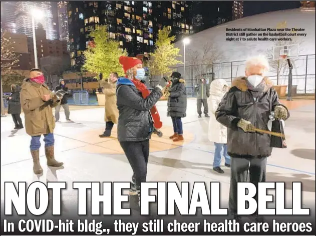  ??  ?? Residents of Manhattan Plaza near the Theater District still gather on the basketball court every night at 7 to salute health care workers.