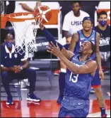  ?? Las Vegas ReviewJour­nal via AP ?? TO THE HOOP United States’ Bam Adebayo lays up the ball during the first half of an exhibition basketball game against Argentina, in Las Vegas on Tuesday.