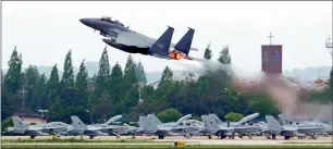  ?? AFP ?? A south Korean Air Force fighter jet takes off from an air base as south Korea and the United states conduct the Max Thunder joint military exercise in gwangju, south Korea. —