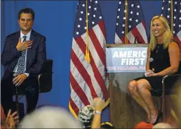  ?? PHELAN M. EBENHACK — THE ASSOCIATED PRESS ?? Rep. Matt Gaetz, R-Fla., and Rep. Marjorie Taylor Greene, R-Ga., address attendees of a rally Friday in The Villages, Fla.