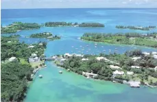  ??  ?? Bermuda’s Somerset Bridge is the smallest drawbridge in the world. worldcomet­omyhome.blogspot.com