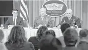  ?? Pablo Martinez Monsivais / Associated Press ?? Marine Gen. Thomas D. Waldhauser, head of the U.S. Africa Command, center, singled out three persons who could be faulted but did not ID them.