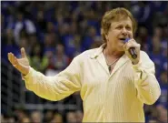  ?? CHARLIE RIEDEL — THE ASSOCIATED PRESS FILE ?? Eddie Money sings the national anthem before an NCAA college basketball game between Kansas and Missouri.