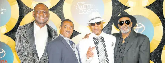  ?? ?? George Brown, from left, Ronald Bell, Dennis Thomas and Robert ‘Kool’ Bell, of Kool and the Gang, appear at the 2014 Soul Train Awards in Las Vegas’. Brown died November 16, 2023 in Los Angeles, after a battle with cancer. Ronald Bell died in 2020 and Dennis Thomas died in 2021. The group is among the 2024 nominees for induction into the Rock & Roll Hall of Fame.