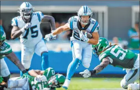  ?? Nell Redmond The Associated Press ?? Carolina’s Christian Mccaffrey had 187 total yards in a Week 1 triumph over the Jets at Bank of America Stadium.