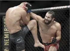  ?? AP file photo ?? Jorge Masvidal punches Nate Diaz during the second round of a welterweig­ht bout at UFC 244 in New York on Nov. 3. On six days’ notice, Masvidal takes on Kamaru Usman today at UFC 251 in Abu Dhabi; it is Masvidal’s first title shot after seven years and 18 fights in the UFC.