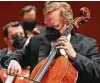  ?? Robin Jerstad / Contributo­r ?? San Antonio Symphony members play in masks, nearly a year after going dark.