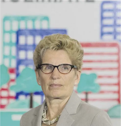  ?? CHRIS YOUNG / THE CANADIAN PRESS ?? “The cost of doing nothing is much, much higher than the cost of going forward and reducing greenhouse
gas emissions,” Ontario Premier Kathleen Wynne says of the cap-and-trade auction.