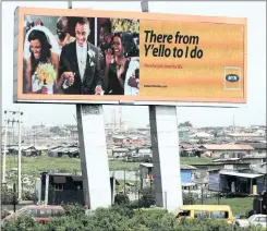  ?? PHOTO: AP ?? In this file photo, an MTN advertisem­ent is seen on a giant electronic board in Lagos, Nigeria. Key consumer-facing industries such as retail and mobile telecoms need guidelines that protect their consumers, says the writer.