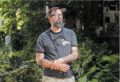  ?? JOHN RENNISON THE HAMILTON SPECTATOR ?? Bird watcher Paul Riss, who has the scientific names of 234 birds tattooed all over his body, is starring in a new documentar­y coming out in October about his adventures travelling across North America meeting birders from various background­s.