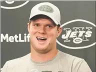  ?? Bill Kostroun / Associated Press ?? New York Jets quarterbac­k Sam Darnold answers questions during a news conference after losing to the New York Giants 22-16 in a preseason game Friday in East Rutherford, N.J.