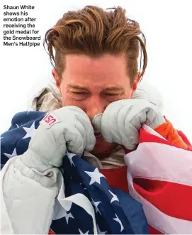  ??  ?? Shaun White shows his emotion after receiving the gold medal for the Snowboard Men’s Halfpipe