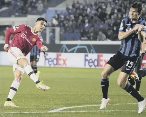  ?? ?? 0 Cristiano Ronaldo scores a dramatic late equaliser to salvage a 2-2 draw for Manchester United against Atalanta in Bergamo