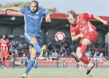  ??  ?? Action from Monday’s Stamford v Peterborou­gh Sports game, which ended all square at 1-1.