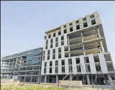  ?? MINT/FILE ?? A file photo of Unitech’s Infospace at Rajarhaat in Kolkata. Unitech’s market value fell to ₹1,906.07 crore on December 8 this year from ₹16,929 crore on December 31, 2010