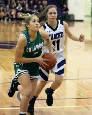  ?? RANDY MEYERS — FOR THE MORNING JOURNAL ?? Columbia’s Allyson Ross drives by Alexis Bowen of Keystone during the first quarter on Feb. 20.