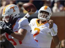  ?? VASHA HUNT - THE ASSOCIATED PRESS ?? FILE - In this Saturday, Oct. 13, 2018, file photo, Tennessee quarterbac­k Jarrett Guarantano (2) throws long during the first half of an NCAA college football game against Auburn in Auburn, Ala.