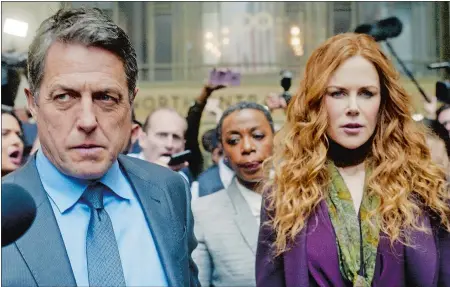  ?? HBO ?? Hugh Grant and Nicole Kidman play Jonathan and Grace Fraser, seen here trailed by Noma Dumezweni as lawyer Haley Fitzgerald, in “The Undoing.”