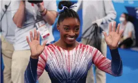  ?? Xavier Laine/Getty Images ?? Simone Biles celebrates her Olympic bronze medal in Tokyo on Tuesday. Photograph: