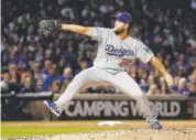  ?? Jamie Squire, Getty Images ?? Los Angeles Dodgers ace Clayton Kershaw has postseason numbers of 6-7 and a 4.40 ERA.