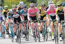  ?? DANIEL DAL ZENNARO
THE ASSOCIATED PRESS ?? Rohan Dennis, centre, wearing the pink jersey, pedals during the sixth stage of the Giro d’Italia cycling race from Caltanisse­tta to Mount Etna.